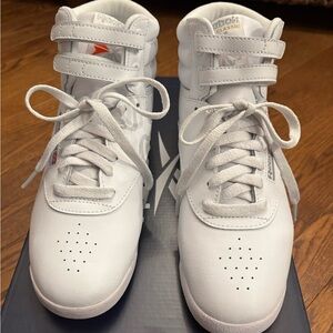 Reebok Women’s Freestyle High Top White and Silver Sneakers